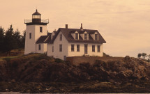 Indian Island Lighthouse with rocky ledge