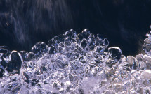Ice bubbles from waterfall spray