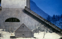 Double-exposed photo church and barn